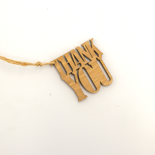 A white background image of a single Thank You wooden gift topper