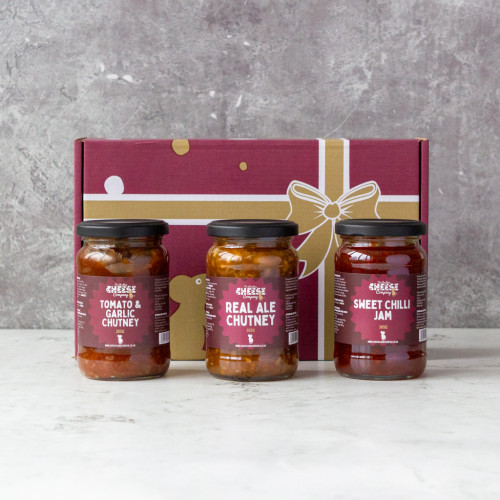 Grey background image of the Chutney Gift Pack 2 including three flavoursome chutneys real ale chutney, tomato and garlic chutney, and sweet chilli jam