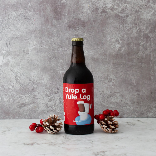 Grey background image of a bottle of Drop A Yule Log Beer