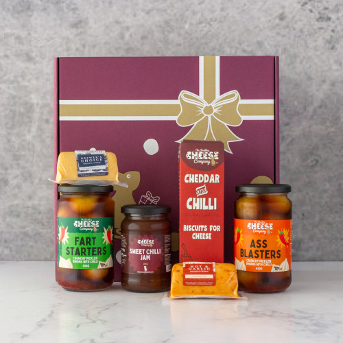 Grey background image of the Farty Pants Hamper with contents laid out in front of the gift box.