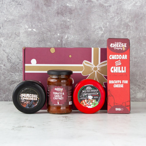 Build your own truckle gift box featuring 2 cheese truckle, a chutney a box of cheese biscuits, available to purchase from the Chuckling Cheese Company